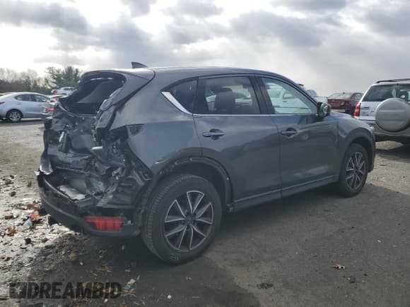 ✅ 2017 Mazda CX-5 Grand Touring • VIN: JM3KFBDL9H0220781 • Lot: 92483545. Wystawiony na Copart z przebiegiem 87 656 mil. Bezpłatny archiwum sprzedaży aukcyjnych z USA i szczegółowy raport historii pojazdu na DreamBid. Zdjęcie 3.