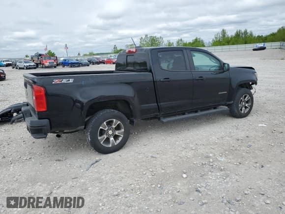 ✅ 2018 Chevrolet Colorado 4WD Z71 • VIN: 1GCGTDEN2J1147255 • Лот: 56698405. Опубликован ранее на Copart с пробегом 105 926 миль. Бесплатный доступ к архиву аукционных продаж из США и подробный отчёт об истории автомобиля на DreamBid. Изображение 3.