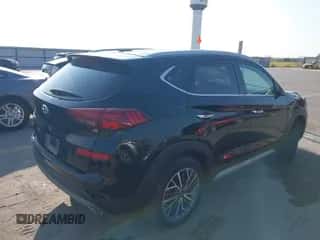 2021 Hyundai Tucson SEL z VIN KM8J33ALXMU315596, wystawiony jako IAAI lot #43202480 z przebiegiem 36 609 mil mil oraz . Historia ofert i sprzedaży dostępna na DreamBid. Obrazek 4.