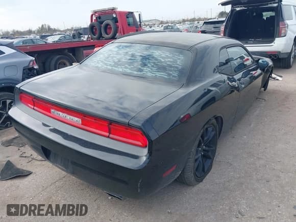 ✅ 2013 Dodge Challenger SXT • VIN: 2C3CDYAG5DH500642 • Lot: 41243016. Wystawiony na IAAI z przebiegiem 199 136 mil. Bezpłatny archiwum sprzedaży aukcyjnych z USA i szczegółowy raport historii pojazdu na DreamBid. Zdjęcie 4.