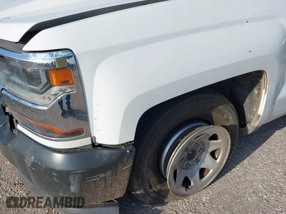 ✅ 2018 Chevrolet Silverado 1500 Work Truck • VIN: 1GCNCNEHXJZ264512 • Лот: 41173158. Опубликован ранее на IAAI с пробегом 126 311 миль. Бесплатный доступ к архиву аукционных продаж из США и подробный отчёт об истории автомобиля на DreamBid. Изображение 18.