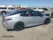 2021 Toyota Camry Hybrid XSE с VIN 4T1K31AK3MU021277, выставлен на аукционе Copart как лот 70713925 с пробегом 110 295 миль миль и Списание • Salvage title. История ставок и продаж доступна на DreamBid. Изображение 3.