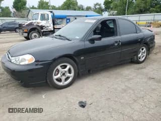✅ 1998 Ford Contour • VIN: 1FALP68GXWK137771 • Лот: 55207535. Опубликован ранее на Copart с пробегом 41 365 миль. Бесплатный доступ к архиву аукционных продаж из США и подробный отчёт об истории автомобиля на DreamBid. Изображение 1.