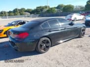 ✅ 2015 BMW 6 Series 640i xDrive • VIN: WBA6B8C55FD453166 • Lot: 41296865. Wystawiony na IAAI z przebiegiem 103 816 mil. Bezpłatny archiwum sprzedaży aukcyjnych z USA i szczegółowy raport historii pojazdu na DreamBid. Zdjęcie 4.