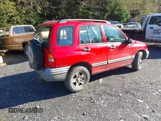 ✅ 2003 Chevrolet Tracker • VIN: 2CNBJ13C836945027 • Lot: 40648277. Listed on IAAI with 110,884 mi. Free auction sales archive from the USA and detailed vehicle history report at DreamBid. Image 4.