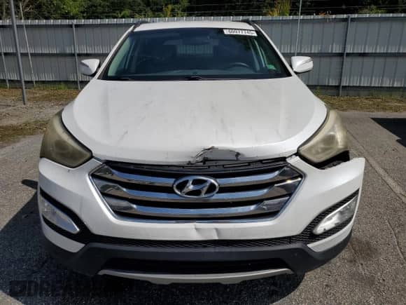 2013 Hyundai Santa Fe Sport z VIN 5XYZU3LA0DG031170, wystawiony jako Copart lot #60977745 z przebiegiem 113 002 mil mil oraz Szkoda całkowita • Salvage title. Historia ofert i sprzedaży dostępna na DreamBid. Obrazek 5.
