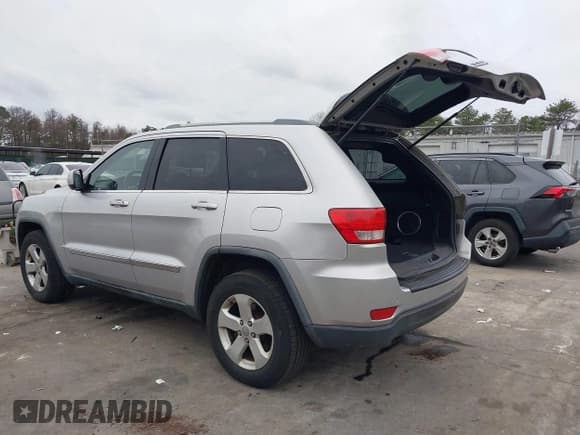 ✅ 2011 Jeep Grand Cherokee Laredo • VIN: 1J4RR4GG4BC671187 • Lot: 43777735. Listed on IAAI with 115,785 mi. Free auction sales archive from the USA and detailed vehicle history report at DreamBid. Image 3.