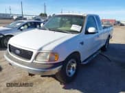 ✅ 2001 Ford F-150 XL • VIN: 1FTRX17L71NB09696 • Lot: 41381323. Listed on IAAI with Not provided. Free auction sales archive from the USA and detailed vehicle history report at DreamBid. Image 2.