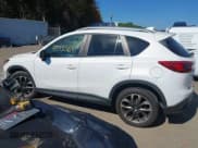 ✅ 2016 Mazda CX-5 Grand Touring • VIN: JM3KE4DY8G0908425 • Lot: 43350691. Wystawiony na IAAI z przebiegiem 144 684 mil. Bezpłatny archiwum sprzedaży aukcyjnych z USA i szczegółowy raport historii pojazdu na DreamBid. Zdjęcie 14.