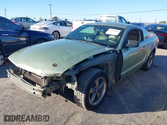 ✅ 2006 Ford Mustang GT Deluxe • VIN: 1ZVFT82H765208128 • Lot: 43752414. Listed on IAAI with 124,252 mi. Free auction sales archive from the USA and detailed vehicle history report at DreamBid. Image 2.