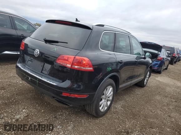 ✅ 2012 Volkswagen Touareg Sport • VIN: WVGFF9BP7CD001145 • Lot: 87206215. Wystawiony na Copart z przebiegiem 115 306 mil. Bezpłatny archiwum sprzedaży aukcyjnych z USA i szczegółowy raport historii pojazdu na DreamBid. Zdjęcie 3.