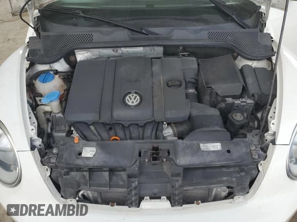 ✅ 2013 Volkswagen Beetle 2.5L • VIN: 3VWFP7AT9DM645933 • Lot: 90586815. Listed on Copart with 111,049 mi. Free auction sales archive from the USA and detailed vehicle history report at DreamBid. Image 11.