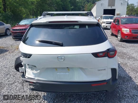 ✅ 2025 Mazda CX-50 S Premium Plus • VIN: 7MMVABEMXSN321379 • Лот: 42897243. Опубликован ранее на IAAI с пробегом 3 694 миль. Бесплатный доступ к архиву аукционных продаж из США и подробный отчёт об истории автомобиля на DreamBid. Изображение 16.