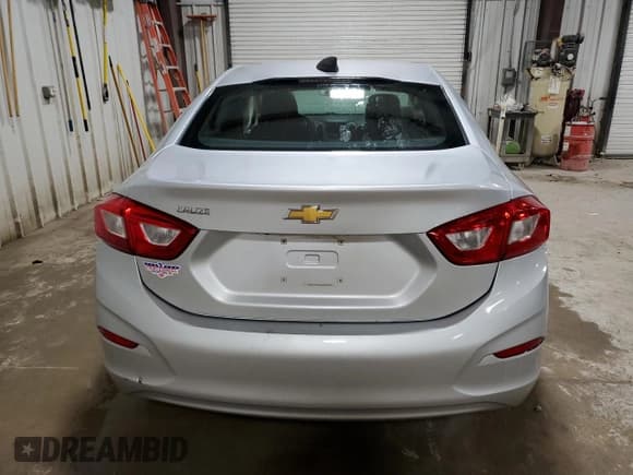 ✅ 2017 Chevrolet Cruze LS • VIN: 1G1BC5SMXH7122910 • Lot: 61137643. Listed on Copart with 58,626 mi. Free auction sales archive from the USA and detailed vehicle history report at DreamBid. Image 6.