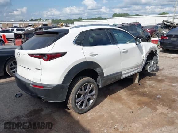 ✅ 2024 Mazda CX-30 S Carbon Edition • VIN: 3MVDMBCM8RM683204 • Lot: 42877652. Listed on IAAI with 7,411 mi. Free auction sales archive from the USA and detailed vehicle history report at DreamBid. Image 4.