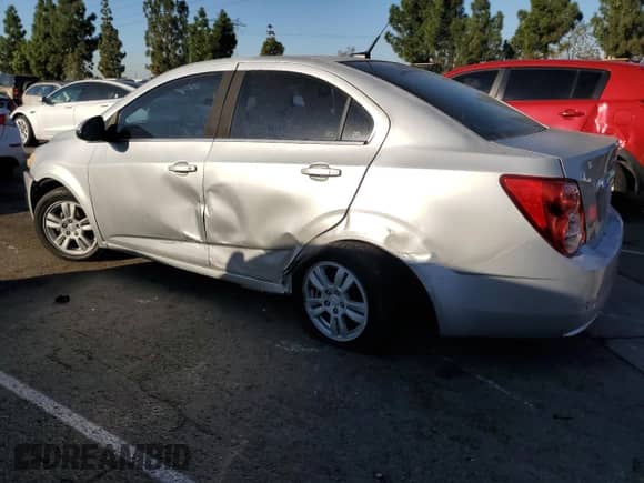 2014 Chevrolet Sonic LT with VIN 1G1JC5SHXE4172203, listed as a Copart auction lot 82361315 with 116,215 mi miles and Salvage title. Bid and sale history available at DreamBid. Image 2.