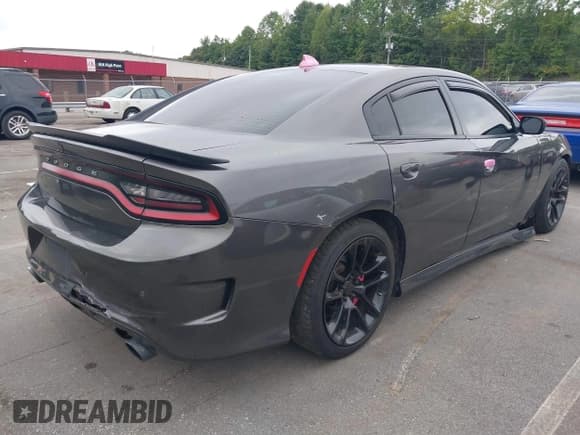✅ 2022 Dodge Charger Scat Pack • VIN: 2C3CDXGJ7NH166273 • Lot: 43039721. Listed on IAAI with 52,601 mi. Free auction sales archive from the USA and detailed vehicle history report at DreamBid. Image 4.
