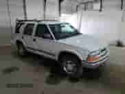 2001 Chevrolet Blazer LT с VIN 1GNDT13W91K224444, выставлен на аукционе Copart как лот 81615015 с пробегом 225 699 миль миль и Списание • Salvage title. История ставок и продаж доступна на DreamBid. Изображение 4.
