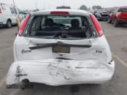 ✅ 2003 Ford Focus ZX3 • VIN: 3FAFP31Z23R147547 • Lot: 42426117. Listed on IAAI with 129,860 mi. Free auction sales archive from the USA and detailed vehicle history report at DreamBid. Image 6.