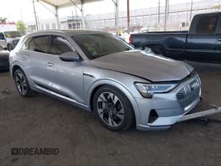 ✅ 2022 Audi e-tron Premium • VIN: WA1AAAGE5NB020579 • Lot: 42574208. Listed on IAAI with 94,760 mi. Free auction sales archive from the USA and detailed vehicle history report at DreamBid. Image 1.