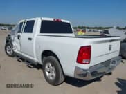 ✅ 2021 Ram 1500 Tradesman • VIN: 3C6RR6KT9MG663776 • Lot: 43423004. Listed on IAAI with 27,801 mi. Free auction sales archive from the USA and detailed vehicle history report at DreamBid. Image 3.