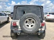 ✅ 2004 Jeep Wrangler Sport • VIN: 1J4FA49SX4P802341 • Lot: 62752565. Listed on Copart with 150,197 mi. Free auction sales archive from the USA and detailed vehicle history report at DreamBid. Image 6.