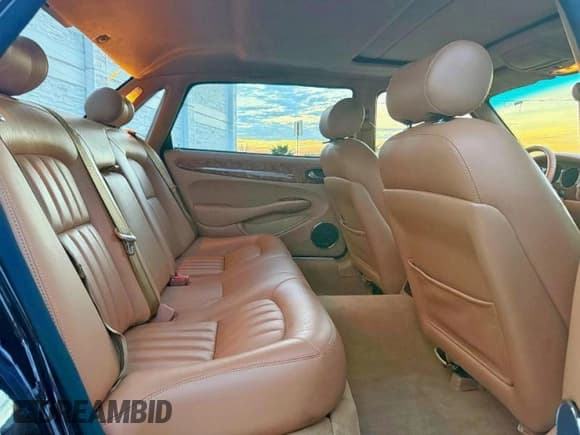 ✅ 2000 Jaguar XJ • VIN: SAJDA23C9YLF18784 • Лот: 91946295. Опубликован ранее на Copart с пробегом 81 605 миль. Бесплатный доступ к архиву аукционных продаж из США и подробный отчёт об истории автомобиля на DreamBid. Изображение 6.