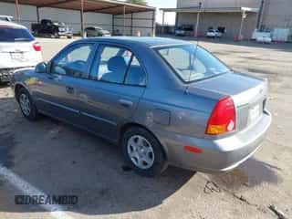 2004 Hyundai Accent GL with VIN KMHCG45C04U531177, listed as a IAAI auction lot 41526033 with 126,102 mi miles and . Bid and sale history available at DreamBid. Image 3.