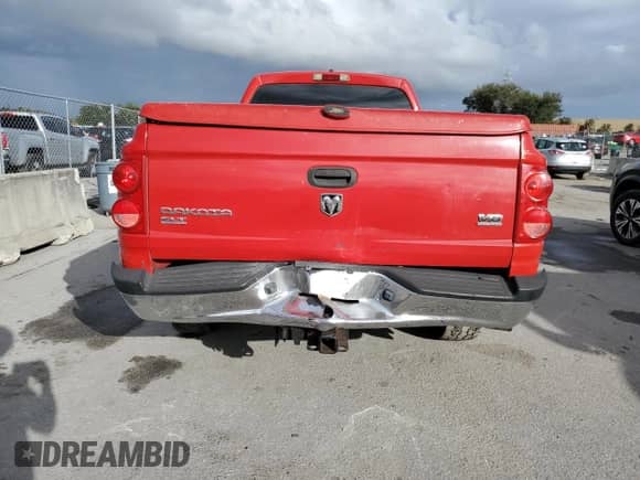 2006 Dodge Dakota SLT с VIN 1D7HW42N46S517113, выставлен на аукционе Copart как лот 79292764 с пробегом 210 005 миль миль и Списание • Salvage title. История ставок и продаж доступна на DreamBid. Изображение 6.