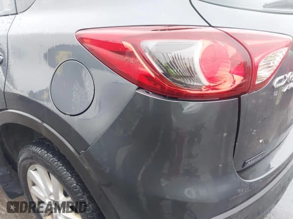 ✅ 2013 Mazda CX-5 Touring • VIN: JM3KE4CE7D0111473 • Lot: 43905917. Listed on IAAI with 222,787 mi. Free auction sales archive from the USA and detailed vehicle history report at DreamBid. Image 6.