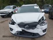 ✅ 2016 Mazda CX-5 Grand Touring • VIN: JM3KE4DY6G0873688 • Lot: 43565324. Wystawiony na IAAI z przebiegiem 80 920 mil. Bezpłatny archiwum sprzedaży aukcyjnych z USA i szczegółowy raport historii pojazdu na DreamBid. Zdjęcie 6.