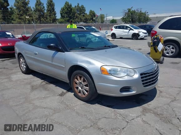 ✅ 2004 Chrysler Sebring GTC • VIN: 1C3EL75R64N329733 • Lot: 42725978. Listed on IAAI with 146,171 mi. Free auction sales archive from the USA and detailed vehicle history report at DreamBid. Image 1.
