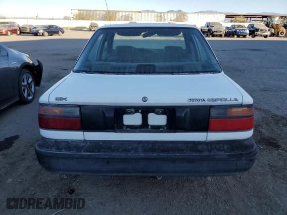 ✅ 1990 Toyota Corolla • VIN: 1NXAE94A9LZ084244 • Lot: 41419155. Wystawiony na Copart z przebiegiem 221 586 mil. Bezpłatny archiwum sprzedaży aukcyjnych z USA i szczegółowy raport historii pojazdu na DreamBid. Zdjęcie 6.