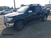 ✅ 2011 Nissan Frontier Pro-4X • VIN: 1N6AD0EV5BC442204 • Lot: 43482225. Listed on IAAI with 177,990 mi. Free auction sales archive from the USA and detailed vehicle history report at DreamBid. Image 2.