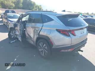 2024 Hyundai Tucson Blue with VIN KM8JBCD14RU209729, listed as a IAAI auction lot 43321625 with 13,661 mi miles and . Bid and sale history available at DreamBid. Image 3.