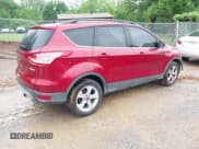 ✅ 2013 Ford Escape SE • VIN: 1FMCU0GX2DUD33640 • Lot: 42255552. Listed on IAAI with 150,018 mi. Free auction sales archive from the USA and detailed vehicle history report at DreamBid. Image 4.