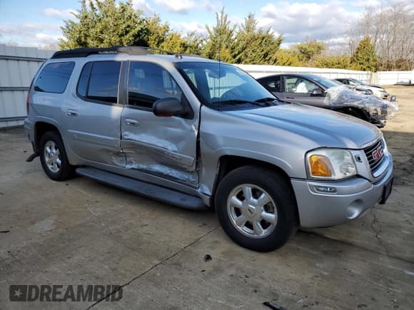 ✅ 2005 GMC Envoy SLT • VIN: 1GKET16S456194696 • Lot: 92130285. Listed on Copart with 201,153 mi. Free auction sales archive from the USA and detailed vehicle history report at DreamBid. Image 4.