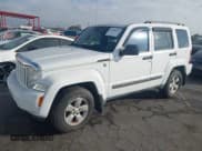 ✅ 2012 Jeep Liberty Sport • VIN: 1C4PJMAK4CW100199 • Lot: 43588161. Listed on IAAI with 64,376 mi. Free auction sales archive from the USA and detailed vehicle history report at DreamBid. Image 2.