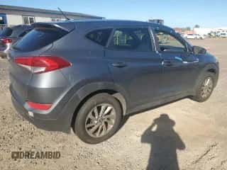 2018 Hyundai Tucson SE with VIN KM8J23A4XJU648002, listed as a Copart auction lot 86509625 with 140,728 mi miles and Clean title. Bid and sale history available at DreamBid. Image 3.