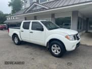 ✅ 2013 Nissan Frontier SV • VIN: 1N6AD0EV0DN741171 • Lot: 67757225. Listed on Copart with 169,234 mi. Free auction sales archive from the USA and detailed vehicle history report at DreamBid. Image 1.