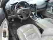 2006 Chevrolet Corvette with VIN 1G1YY26U565113187, listed as a Copart auction lot 84220834 with 153,208 mi miles and Salvage title. Bid and sale history available at DreamBid. Image 8.