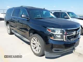 2015 Chevrolet Suburban LT z VIN 1GNSCJKC7FR142418, wystawiony jako IAAI lot #43195354 z przebiegiem 221 278 mil mil oraz . Historia ofert i sprzedaży dostępna na DreamBid. Obrazek 1.