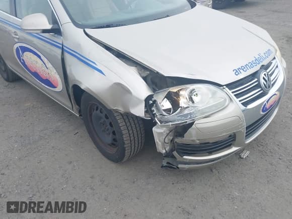 ✅ 2005 Volkswagen Jetta 2.5L • VIN: 3VWRF71K95M612973 • Lot: 41610256. Listed on IAAI with 124,458 mi. Free auction sales archive from the USA and detailed vehicle history report at DreamBid. Image 6.