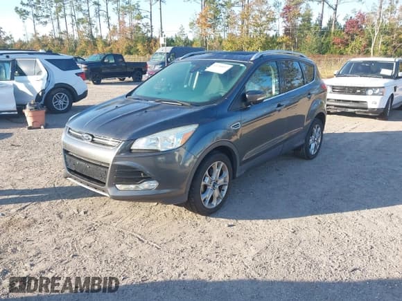 ✅ 2016 Ford Escape Titanium • VIN: 1FMCU0JX8GUB20446 • Lot: 43740057. Wystawiony na IAAI z przebiegiem 101 781 mil. Bezpłatny archiwum sprzedaży aukcyjnych z USA i szczegółowy raport historii pojazdu na DreamBid. Zdjęcie 2.