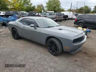 2009 Dodge Challenger SE z VIN 2B3LJ44V49H542302, wystawiony jako Copart lot #71263994 z przebiegiem 158 718 mil mil oraz Szkoda całkowita • Salvage title. Historia ofert i sprzedaży dostępna na DreamBid. Obrazek 4.