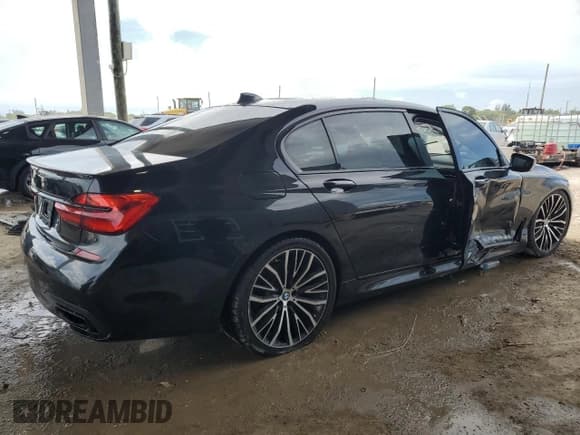 ✅ 2019 BMW 7 Series 740i • VIN: WBA7E2C52KB216875 • Lot: 67796945. Listed on Copart with 92,363 mi. Free auction sales archive from the USA and detailed vehicle history report at DreamBid. Image 3.