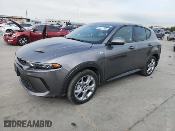 ✅ 2024 Dodge Hornet R/T • VIN: ZACPDFCW9R3A32238 • Lot: 89717545. Listed on Copart with 43,766 mi. Free auction sales archive from the USA and detailed vehicle history report at DreamBid. Image 1.