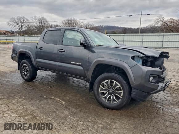 ✅ 2023 Toyota Tacoma TRD Off Road • VIN: 3TMCZ5AN9PM586277 • Lot: 94090515. Listed on Copart with 27,646 mi. Free auction sales archive from the USA and detailed vehicle history report at DreamBid. Image 4.