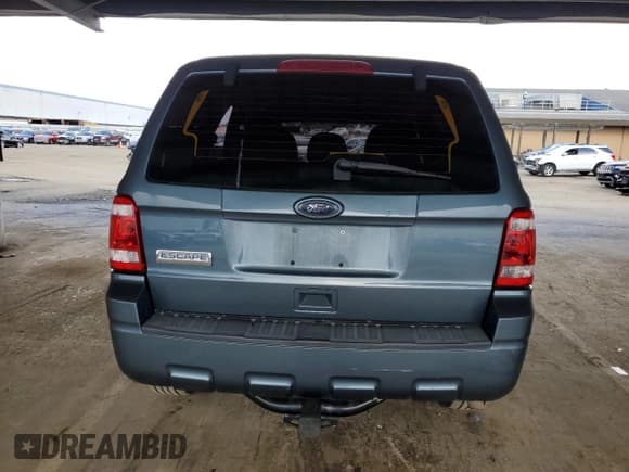 ✅ 2010 Ford Escape XLS • VIN: 1FMCU0C71AKC66736 • Lot: 93379765. Wystawiony na Copart z przebiegiem 233 724 mil. Bezpłatny archiwum sprzedaży aukcyjnych z USA i szczegółowy raport historii pojazdu na DreamBid. Zdjęcie 6.