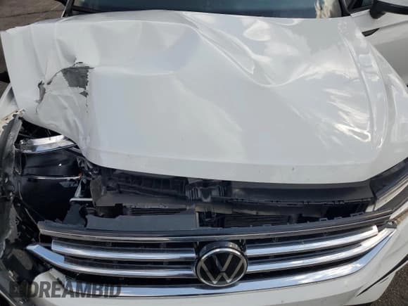 ✅ 2023 Volkswagen Tiguan S • VIN: 3VVRB7AX6PM044809 • Lot: 81716895. Listed on Copart with 15,930 mi. Free auction sales archive from the USA and detailed vehicle history report at DreamBid. Image 12.